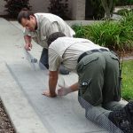 Screen being installed at an apartment complex. Capitola.